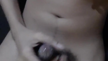 Masturbating