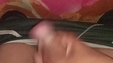 Masturbating