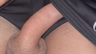 Masturbating