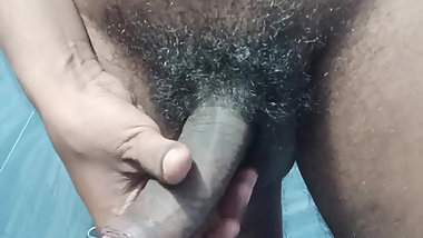 Masturbating