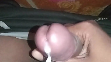 Masturbating